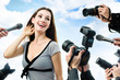Photographers are taking a picture of a film star