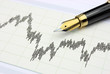 Foto: Stock chart and fountain pen Stock chart and fountain pen