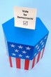 Ballot box with Vote for Democracts voting card