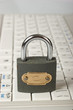 Laptop keyboard with metal padlock