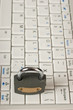 Laptop keyboard with metal padlock