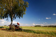 On countryside, old agricultural machine