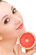 pretty woman with orange isolated on the white background