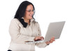 Business lady typing and looking at laptop