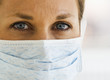 Close up of Female Doctor with Mask on.