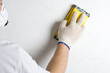 Image : Apartment repair. Processing of a wall by an sandpaper.