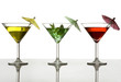 three cocktails with umbrella