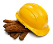 Yellow hardhat and old leather gloves isolated Yellow hardhat and old leather gloves isolated