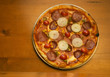Serving pizza