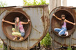two beautiful girls sit in circles and listening music