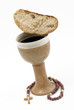 Red wine and bread - communion on the white background