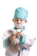 Little boy in doctor suite taking care of teddy isolated