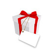 Geschenk mit Karte und roter Schleife