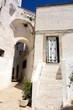 A corner in Ostuni, a whitewashed village in Apulia, Italy