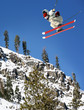 A young man jumping high at Lake Tahoe resort