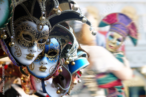 Row of venetian masks in gold and blue