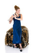 Attractive young female flautist, flutist playing the flute.