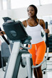 beautiful woman at the gym exercising in the cardio
