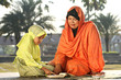 Muslim Mother and Child Reading Qur'an