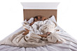 african american couple in bed sleeping