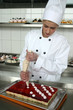 Young girl baking cakes