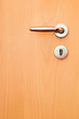 wooden door with metal handle