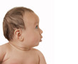 cute baby girl surprised, profile on white background