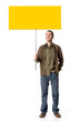 Casual young man holding a placard, looking up