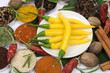 Yellow chili peppers and other aromatic herbs and spices Yellow chili peppers and other aromatic herbs and spices