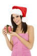 Beautiful Caucasain female holding gifts on white background