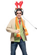 Casual young man with reindeer horns and headphones