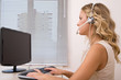 customer service representative at the office with computer