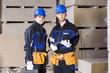 Two construction workers with check list Two construction workers with check list