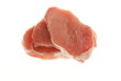 Three boneless pork chops or pork steaks on a white background