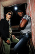 Portrait of two trendy young men posing with attitude