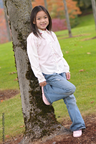 Little Chinese girl posed for a photo shoot