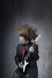 Emotional photo of the man playin on electric guitar