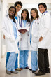 doctors in a hospital looking at the camera