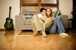 Happy young couple having fun on the sofa Happy young couple having fun on the sofa