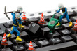 computer repair concept - workers repairing keyboard computer repair concept - workers repairing keyboard