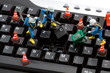 computer repair concept - workers repairing keyboard