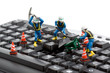 computer repair concept - workers repairing keyboard computer repair concept - workers repairing keyboard