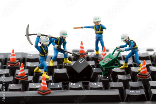 Repair on Computer Repair Concept Workers Repairing Keyboard Dinostock