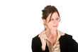 Attractive young Caucasian business woman looking irritated