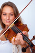Violinist playing her violin focus on fingers