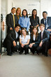 office business team all smiling and looking happy