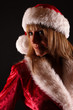 Foto: Portrait Weihnachtsfrau mit Nikolausmütze Portrait Weihnachtsfrau mit Nikolausmütze
