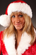 Foto: Portrait Weihnachtsfrau mit Nikolausmütze Portrait Weihnachtsfrau mit Nikolausmütze