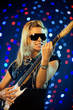 Beautiful female guitar player