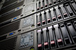 Photo: Servers stack with hard drives in a datacenter rack Servers stack with hard drives in a datacenter rack